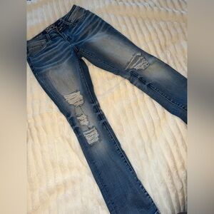 Buckle Distressed Blue Jeans